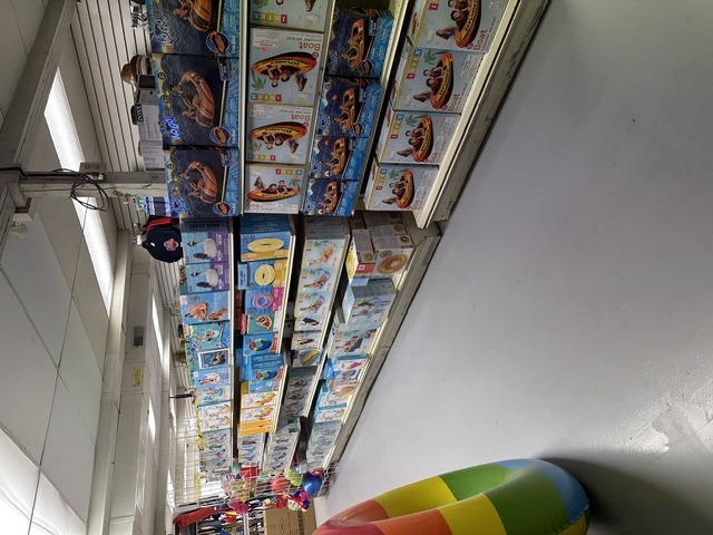 Stacked inflatable boats, tubes and pool floats at Bayview's Turkey Point beach store